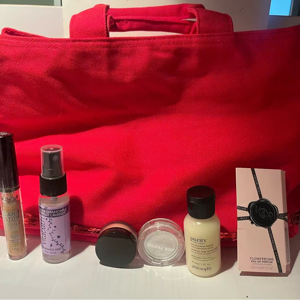 Red Tote Bag with Assorted Beauty Products